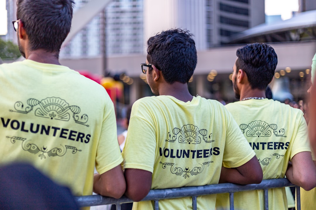 Volunteers in matching printed shirts